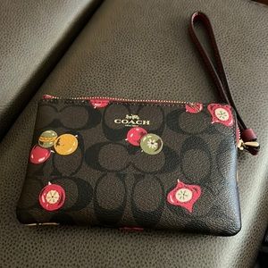 Coach Corner Zip Wristlet In Signature Canvas With Ornament Print